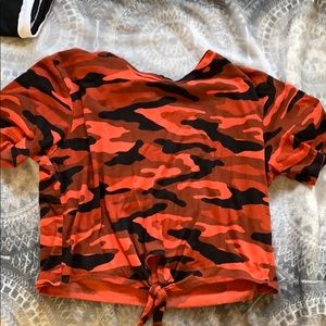 Camouflage orange shirt.